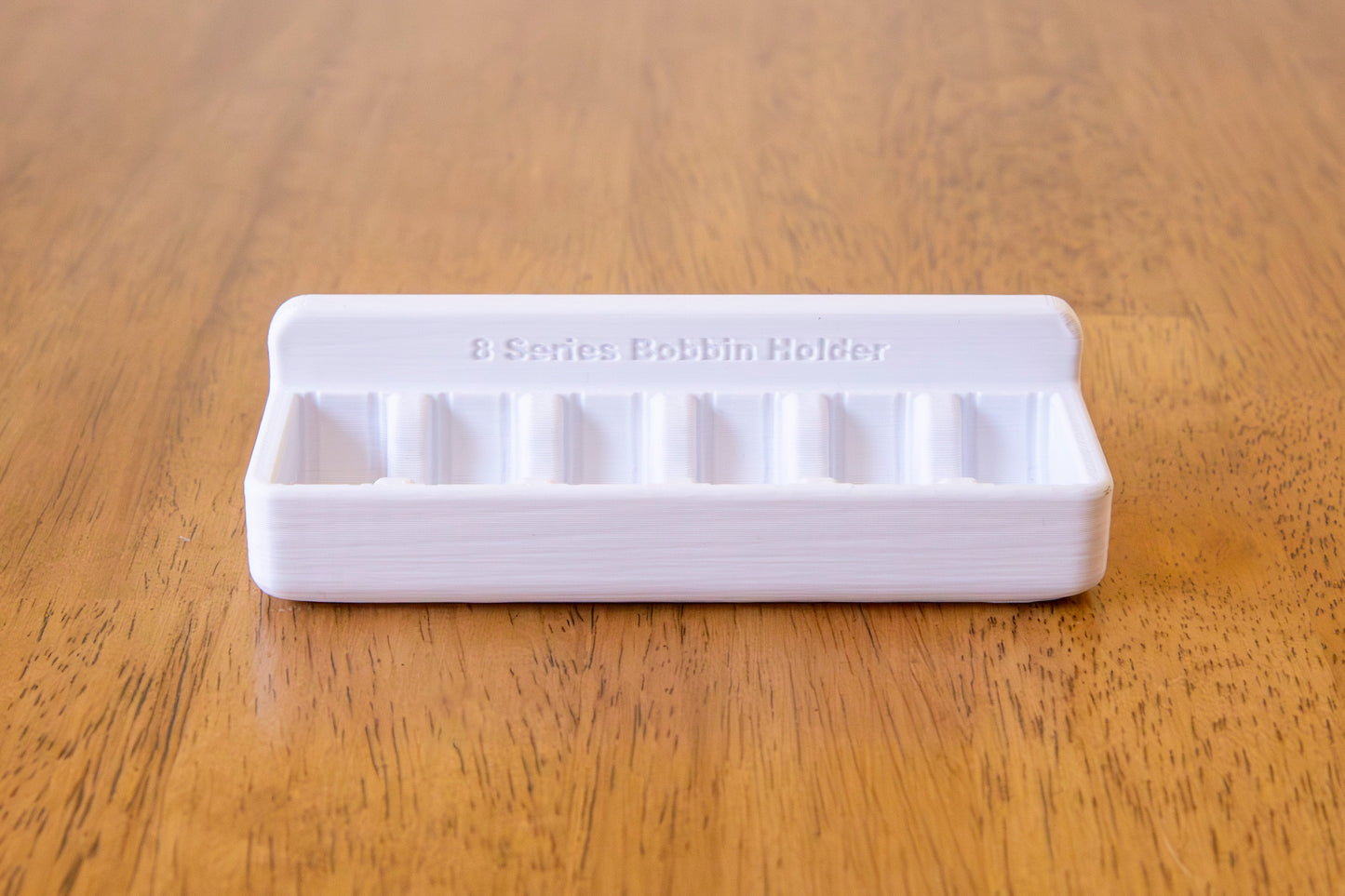 Bernina 8 Series Bobbin Stick On Holder (Holds 6 Bobbins)