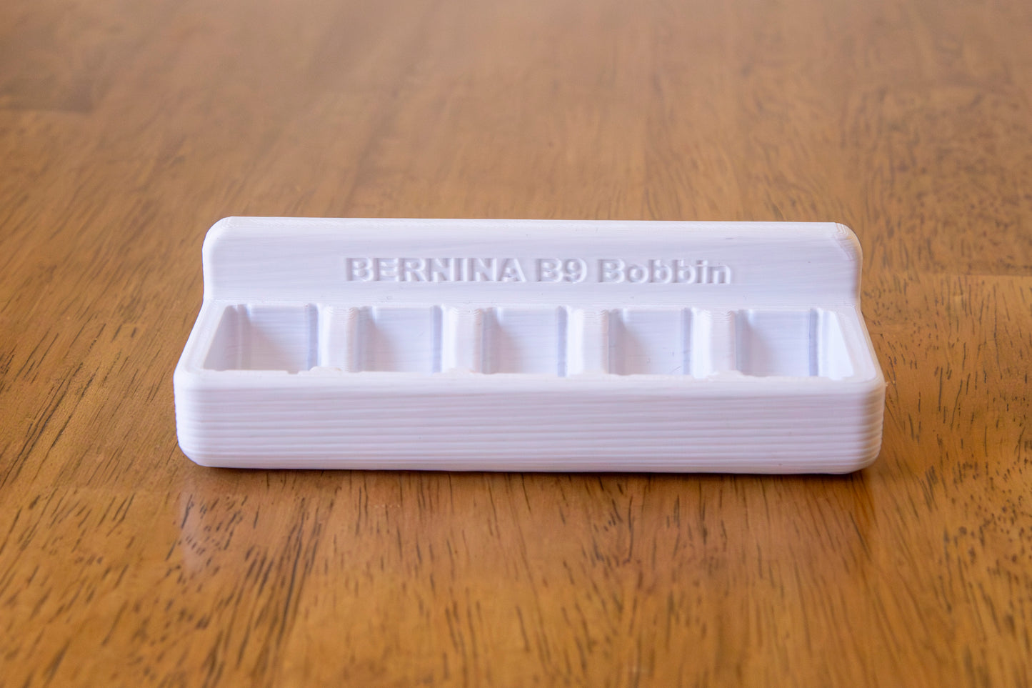 Bernina B9 Bobbin Stick On Holder (Holds 5 Bobbins)